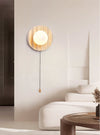 yellow travertine glass sphere wall sconce