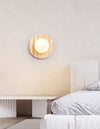 yellow travertine glass sphere wall sconce