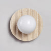 yellow travertine glass sphere wall sconce