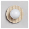 yellow travertine glass sphere wall sconce