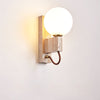 yellow travertine opal glass globe wall sconce 4