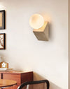 yellow travertine opal glass orb wall sconce