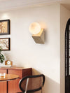 yellow travertine opal glass orb wall sconce