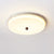 yellow travertine orb flush mount ceiling light