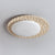 yellow travertine pebbled flush mount ceiling light