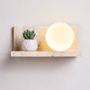 yellow travertine shelf wall sconce