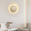 yellow travertine sphere led wall sconce