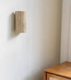 yellow travertine striped cylinder wall lamp