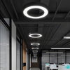 Modern round ring LED pendant light in black or white for offices and gyms