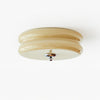 Art Deco flush mount ceiling light with a ribbed glass shade