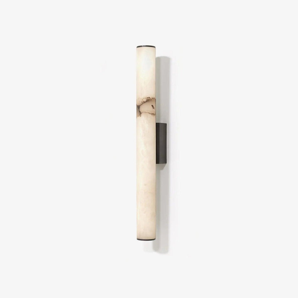 Callisto alabaster wall sconce with brass frame mounted on a wall