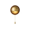 Ash wood wall sconce with brass shade and pull cord switch