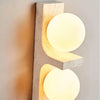 asymmetrical-travertine-wall-sconce