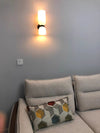 Modern Glass Wall Sconce with Brass or Black Finish for Bedroom and Hallway