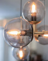 Orb Glass Pendant Light with Brass Accents for Dining Room and Kitchen Island