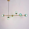 Orb Glass Pendant Light with Brass Accents for Dining Room and Kitchen Island