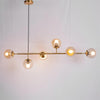 Orb Glass Pendant Light with Brass Accents for Dining Room and Kitchen Island