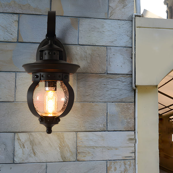 1 Light Seeded Glass Globe Led Outdoor Wall Lantern With Curved Arm