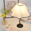 black metal table lamp with white linen shade for bedside and office