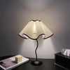 black metal table lamp with white linen shade for bedside and office