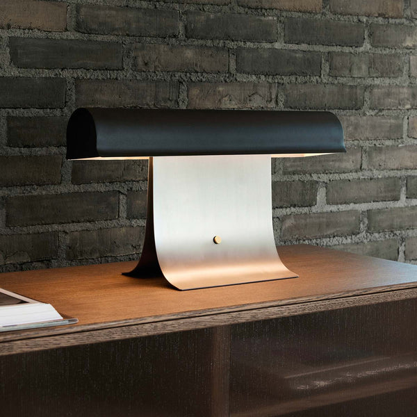 black paper table lamp with stainless steel for bedside reading nook