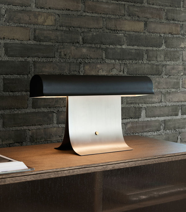 black paper table lamp with stainless steel for bedside reading nook