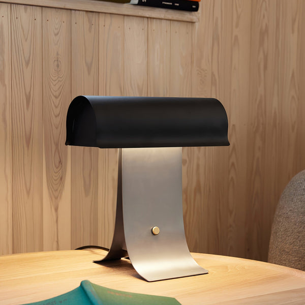 black paper table lamp with stainless steel for bedside reading nook