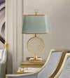 blue fabric shade gold table lamp for bedroom reading nook