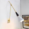 brass swing arm wall lamp with aluminum shade for bedroom and reading nook