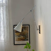 brass swing arm wall lamp with aluminum shade for bedroom and reading nook