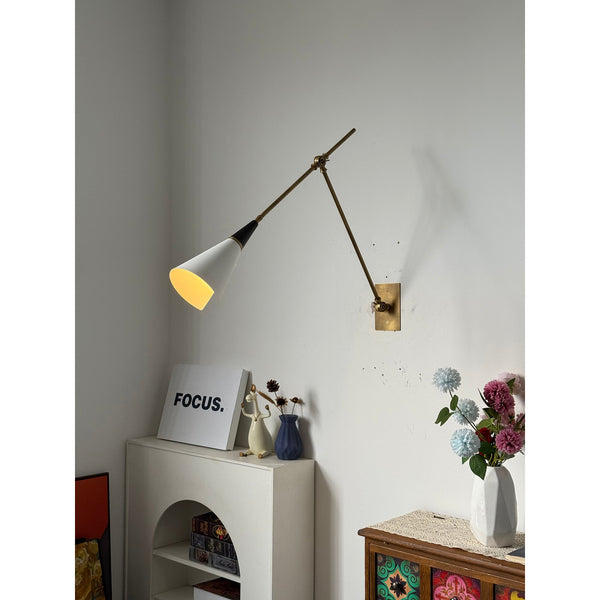 brass swing arm wall lamp with aluminum shade for bedroom and reading nook