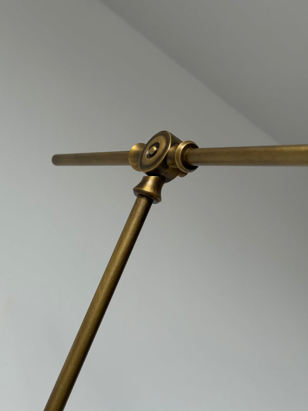 brass swing arm wall lamp with aluminum shade for bedroom and reading nook