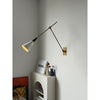 brass swing arm wall lamp with aluminum shade for bedroom and reading nook