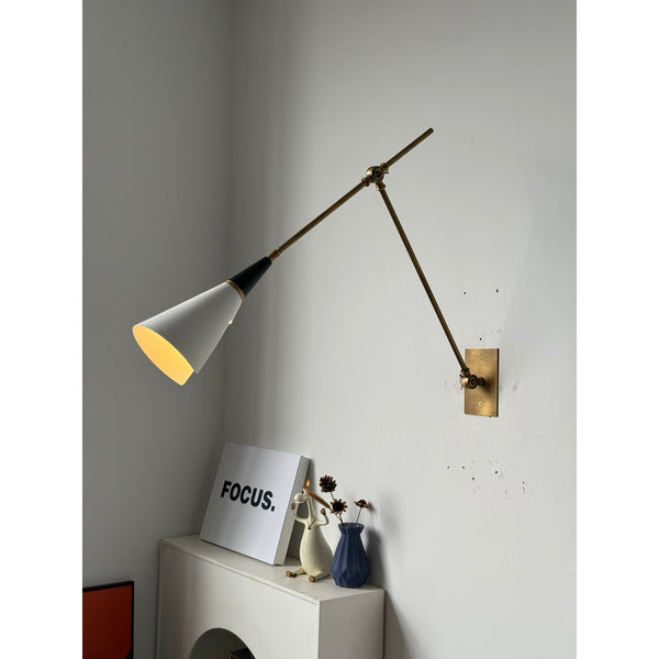 brass swing arm wall lamp with aluminum shade for bedroom and reading nook
