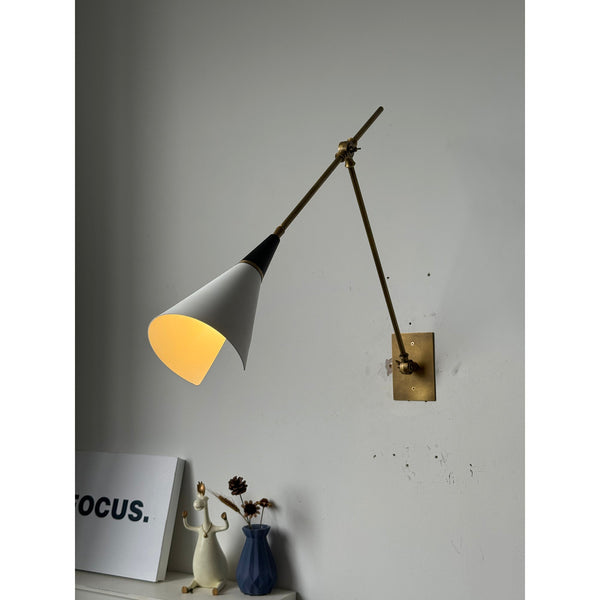 brass swing arm wall lamp with aluminum shade for bedroom and reading nook