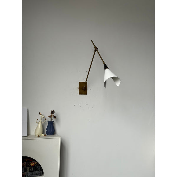 brass swing arm wall lamp with aluminum shade for bedroom and reading nook