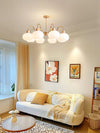 cream glass persimmon chandelier gold wood dining room