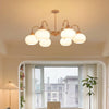 cream glass persimmon chandelier gold wood dining room