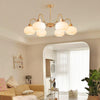 cream glass persimmon chandelier gold wood dining room
