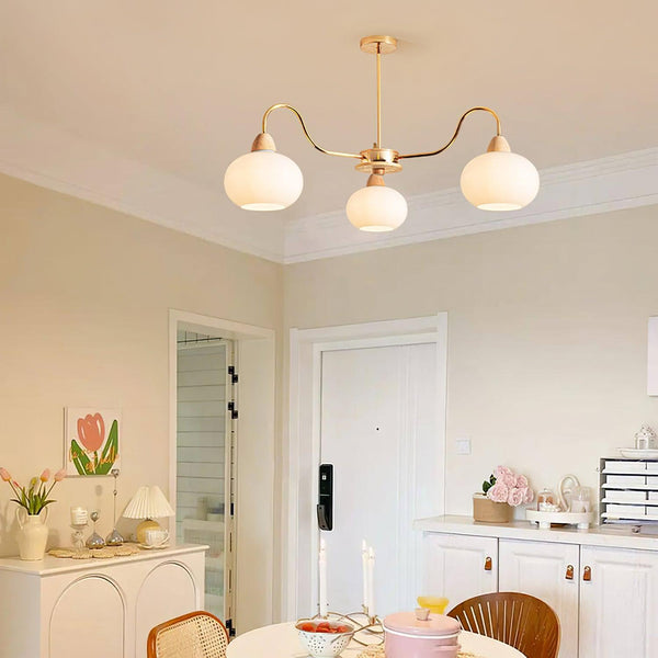 cream glass persimmon chandelier gold wood dining room