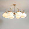 cream glass persimmon chandelier gold wood dining room