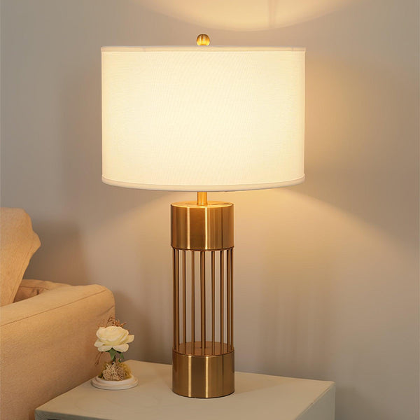 gold metal table lamp white fabric drum shade bedroom living room