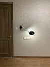 mid century black aluminum swing arm wall lamp