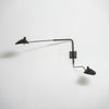 mid century black aluminum swing arm wall lamp