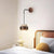 modern beige travertine cylinder wall sconce