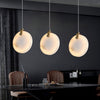 modern brass alabaster disc pendant light