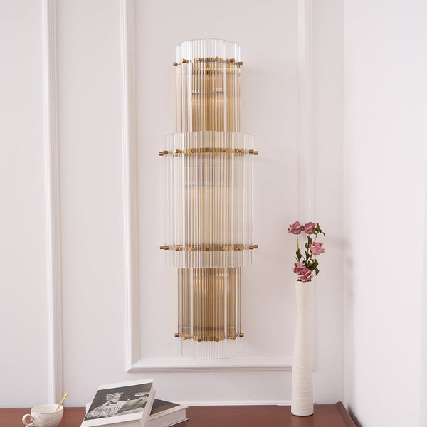 modern brass clear glass rod wall light