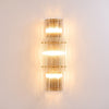 modern brass clear glass rod wall light