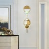 modern brass green glass wall sconce