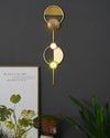 modern brass green glass wall sconce